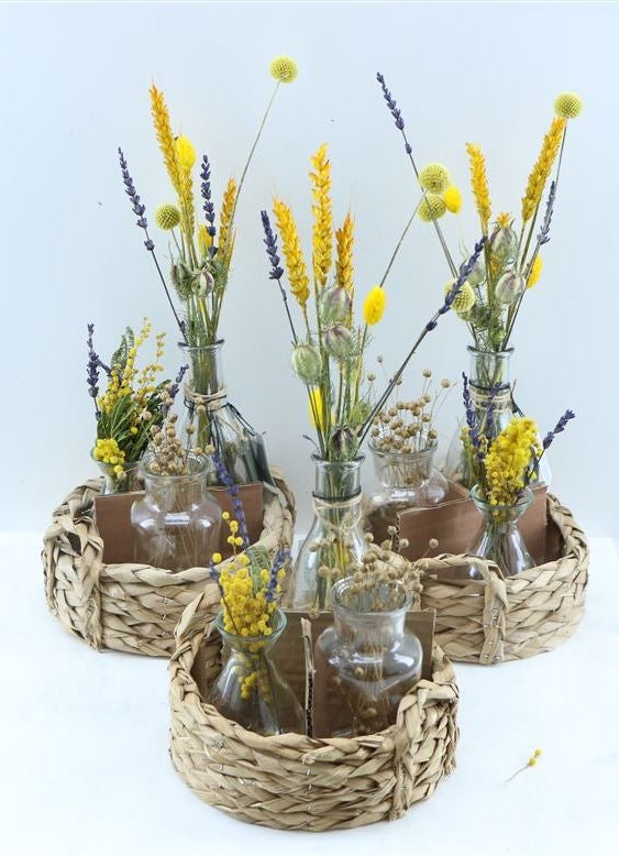 Basket with 3 bottles with yellow dry flowers arrangements